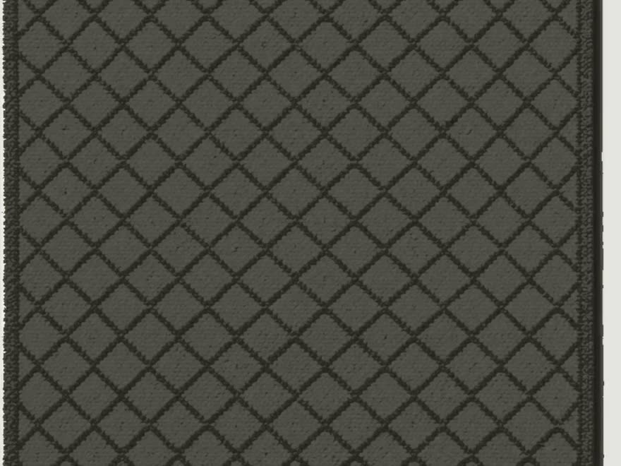 The rug in Char: a near-black ground with a darker lattice.